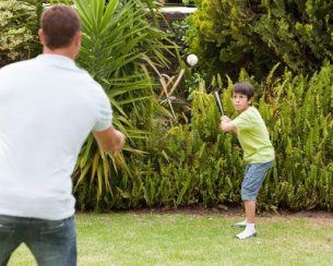 Image result for kid playing baseball with dad